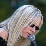 kerri closeup with mic in color copy 2